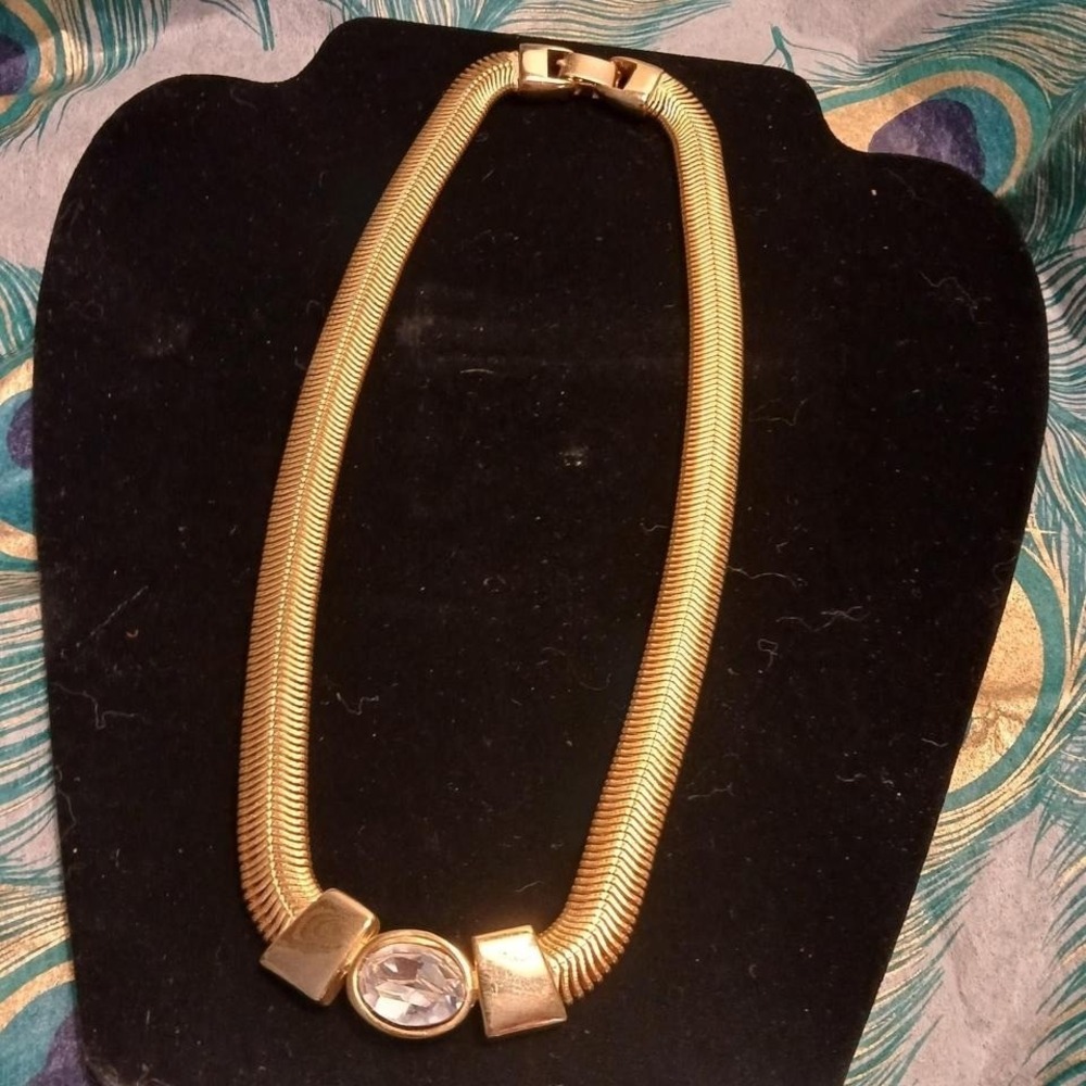 Vintage 1980s gold toned herringbone power necklace with faux diamond pendant